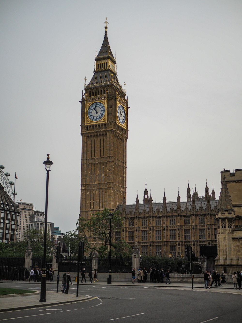 a large clock tower towering over a city