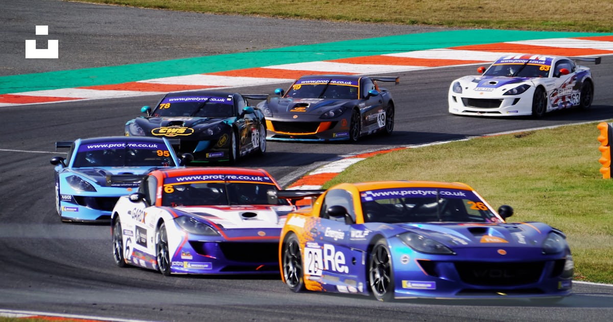A group of cars racing on a race track photo – Free Brands hatch ...