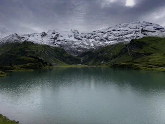 A serene mountain landscape symbolizing the union of science and spirituality.