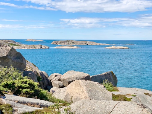 a large body of water surrounded by rocks