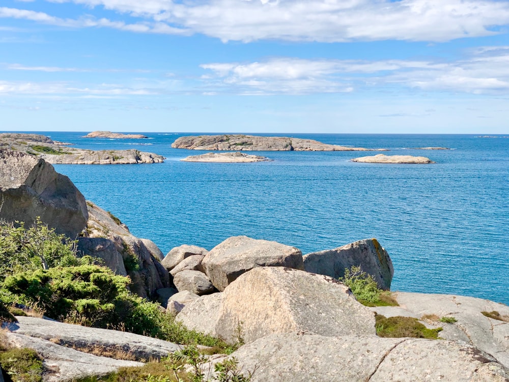 a large body of water surrounded by rocks