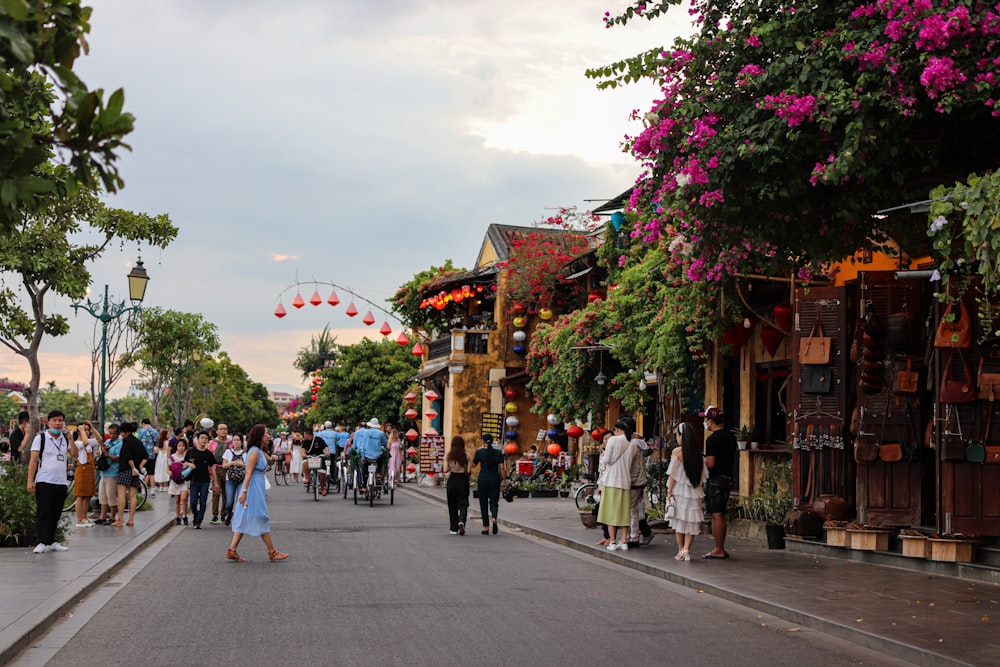 a group of people walking down a street