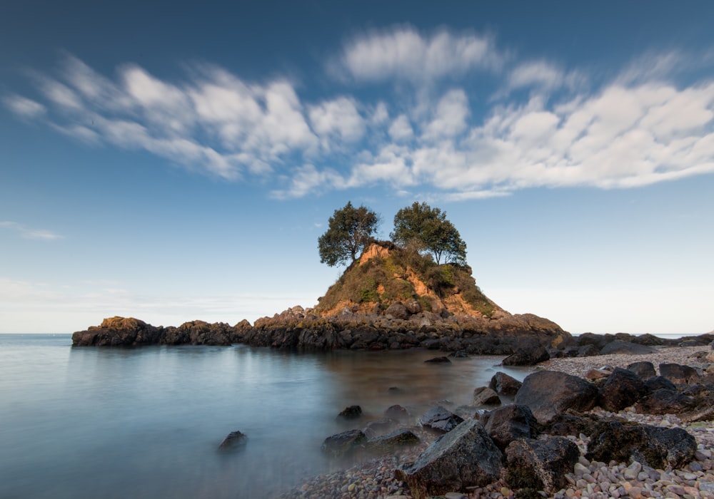 a small island in the middle of a body of water