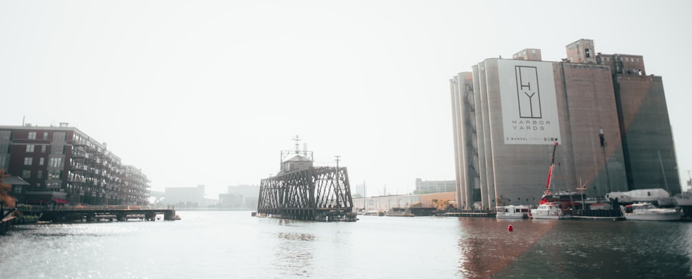 a body of water next to a large building