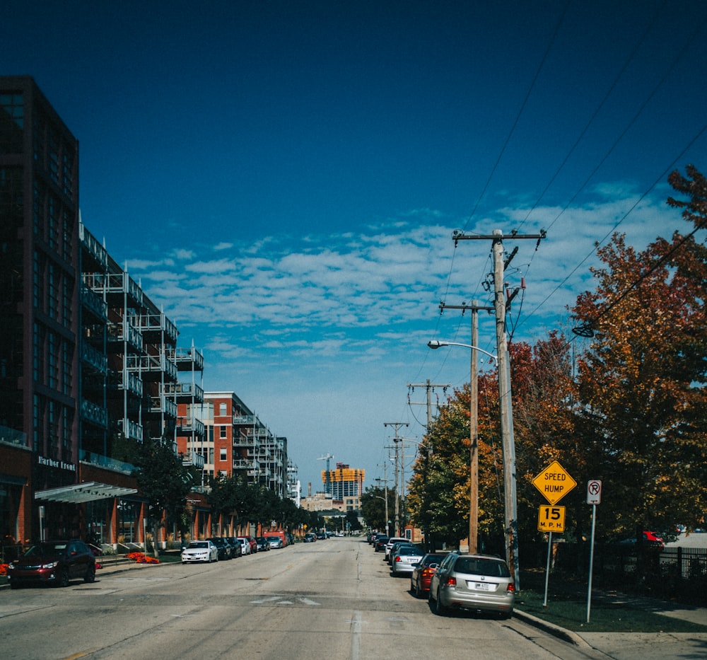 a street with cars parked on both sides of it