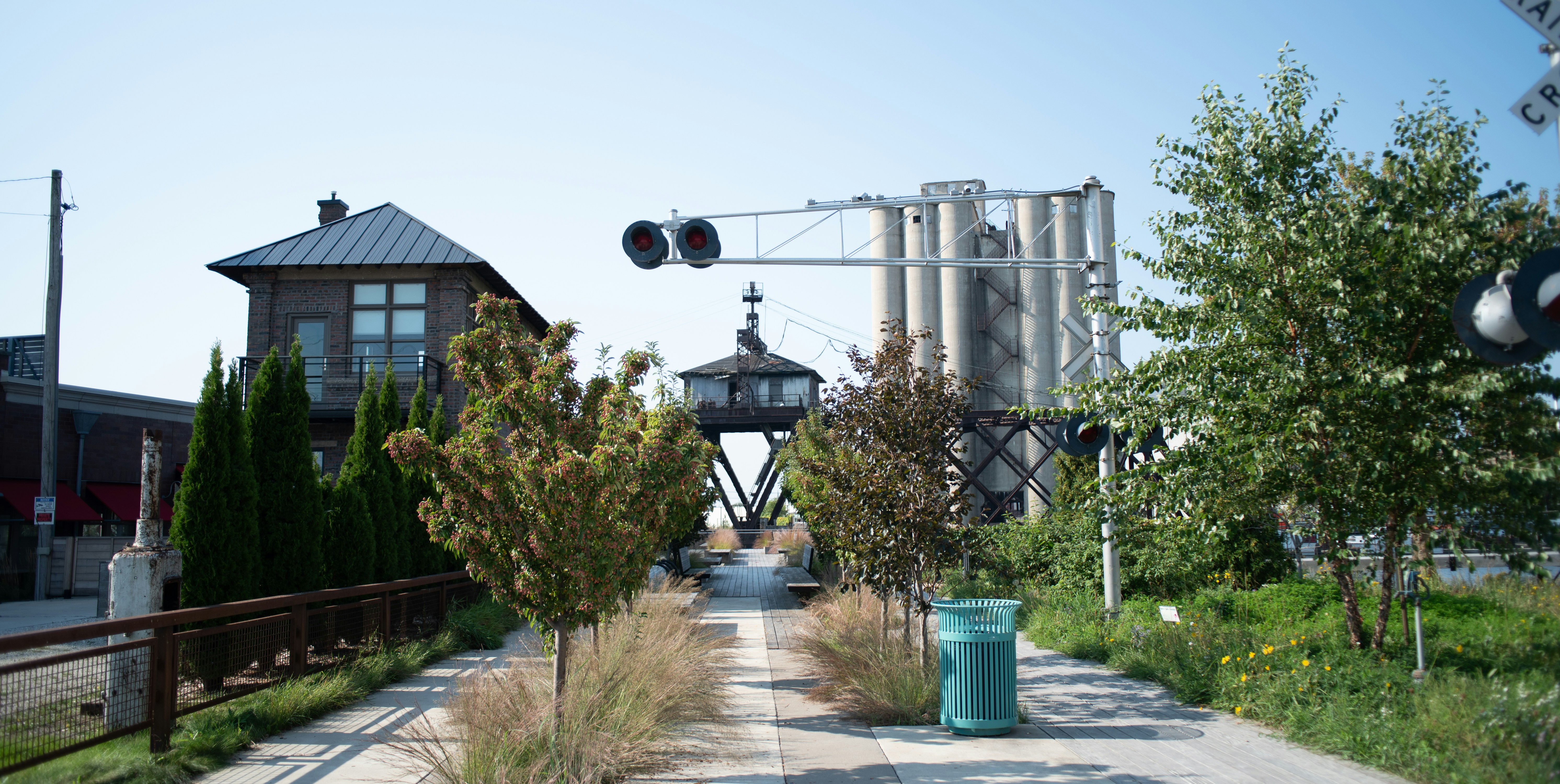 a view of a city street with a traffic light