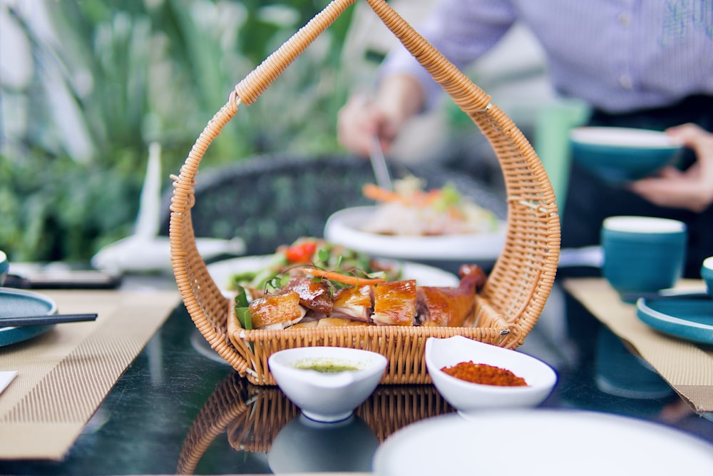 a basket of food sitting on top of a table