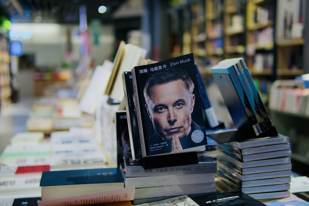 a pile of books sitting on top of a table