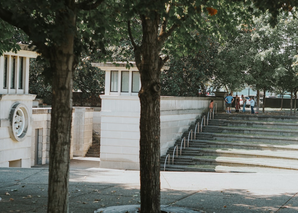 a group of people walking up and down some steps