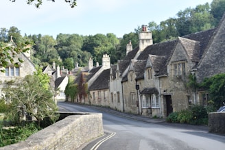 A quaint, charming guesthouse nestled in a quiet village street.