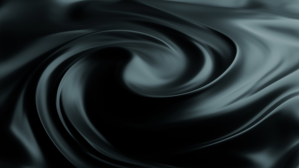 a black and white photo of a wavy fabric