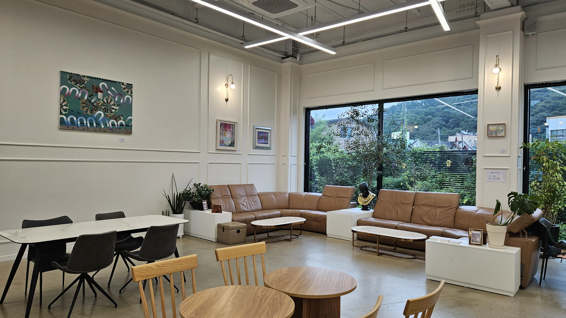 Inviting common lounge area with plush seating and tasteful artwork.