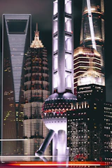 A sleek nighttime Ankara skyline with illuminated ultra-luxury buildings reflecting financial strength.