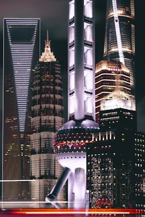 A sleek nighttime Ankara skyline with illuminated ultra-luxury buildings reflecting financial strength.