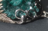 A close-up of a unique handcrafted jewelry piece.