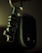 A close-up of a keychain with a metallic keyring attached to a black car key. The keychain features the word 'Jeep' in bold, metallic letters.
