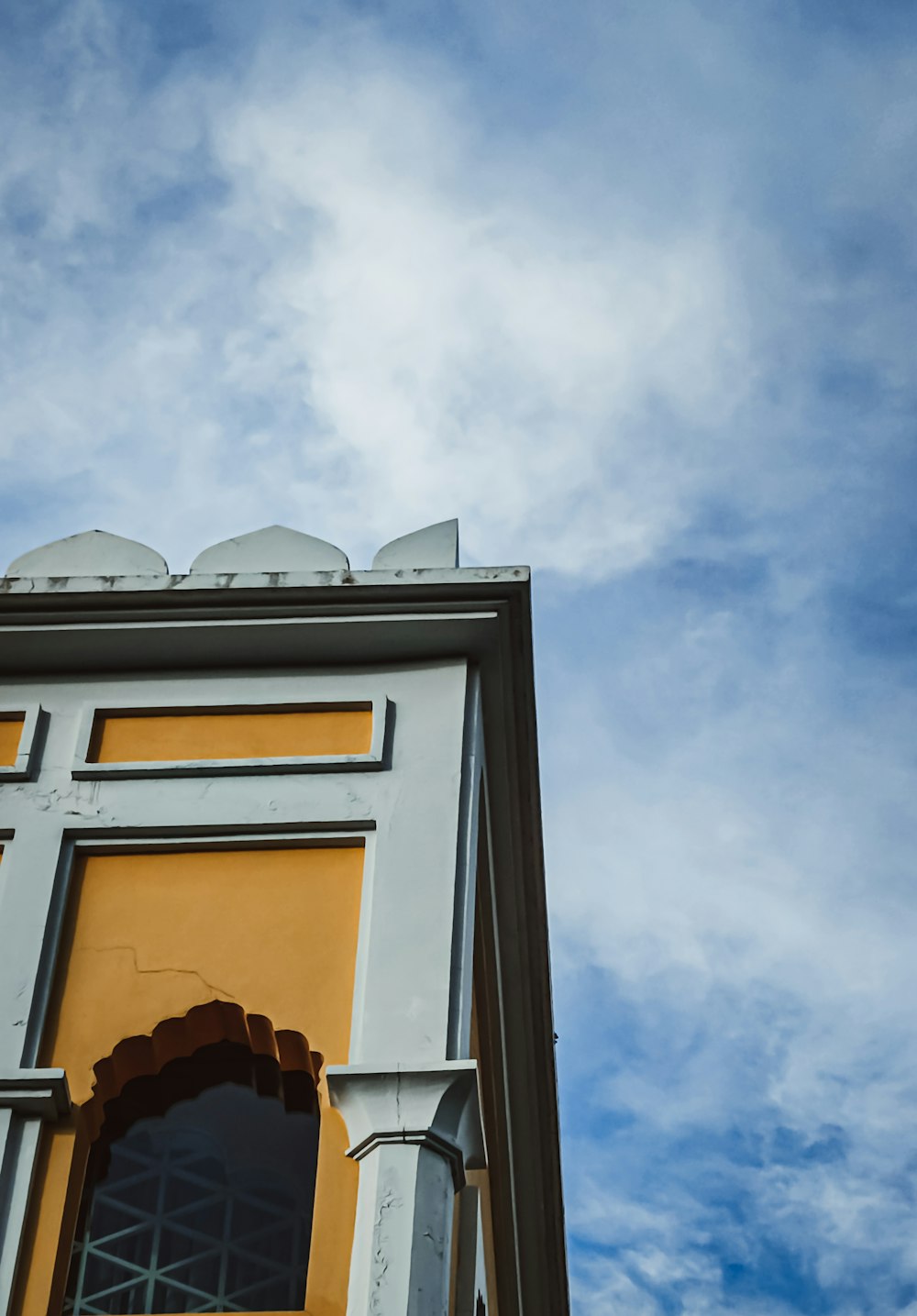 a tall building with a clock on the top of it