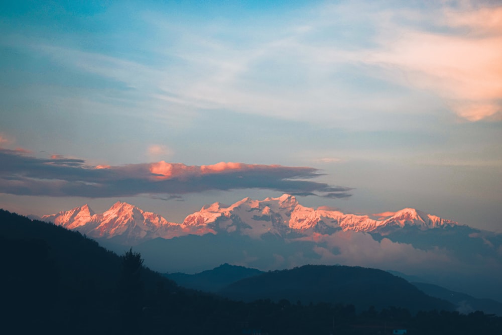 a view of a mountain range at sunset