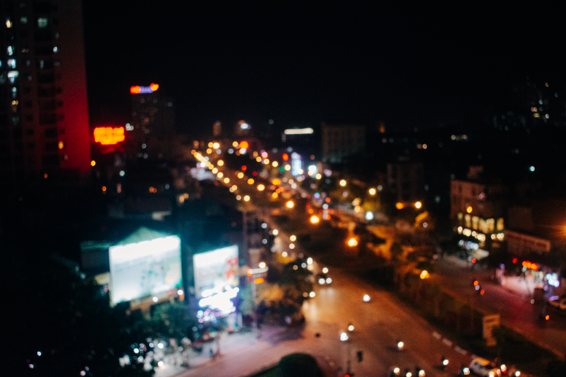 woman wearing yellow long-sleeved dress under white clouds and blue sky during daytime