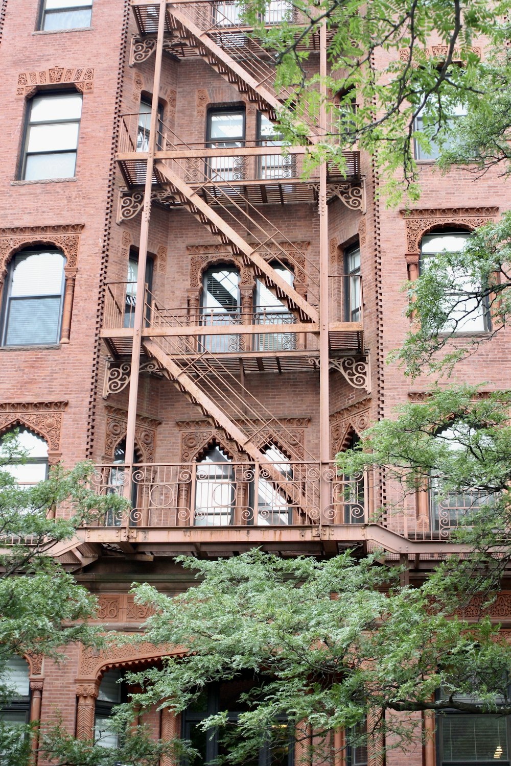 a tall brick building with lots of windows