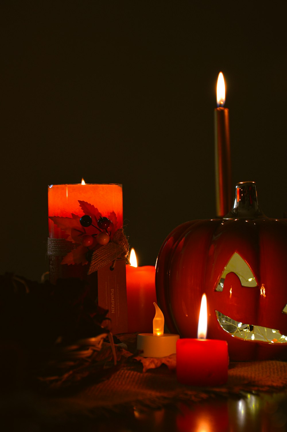 a couple of pumpkins sitting on top of a table