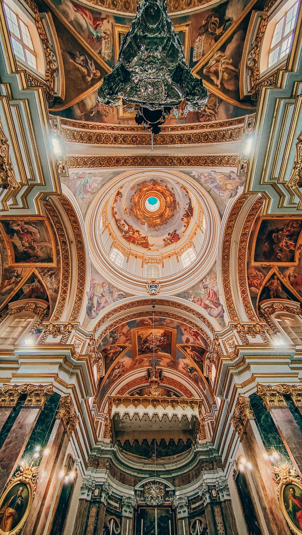 the ceiling of a church with a large dome