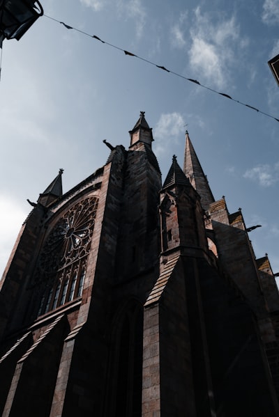 a tall building with a clock on the side of it