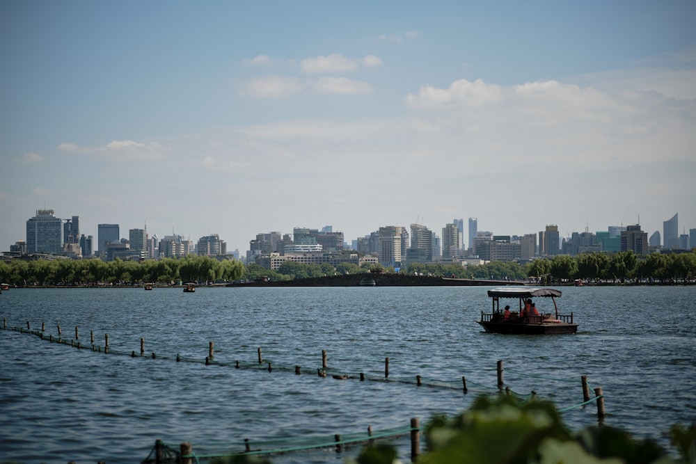 a small boat in a large body of water