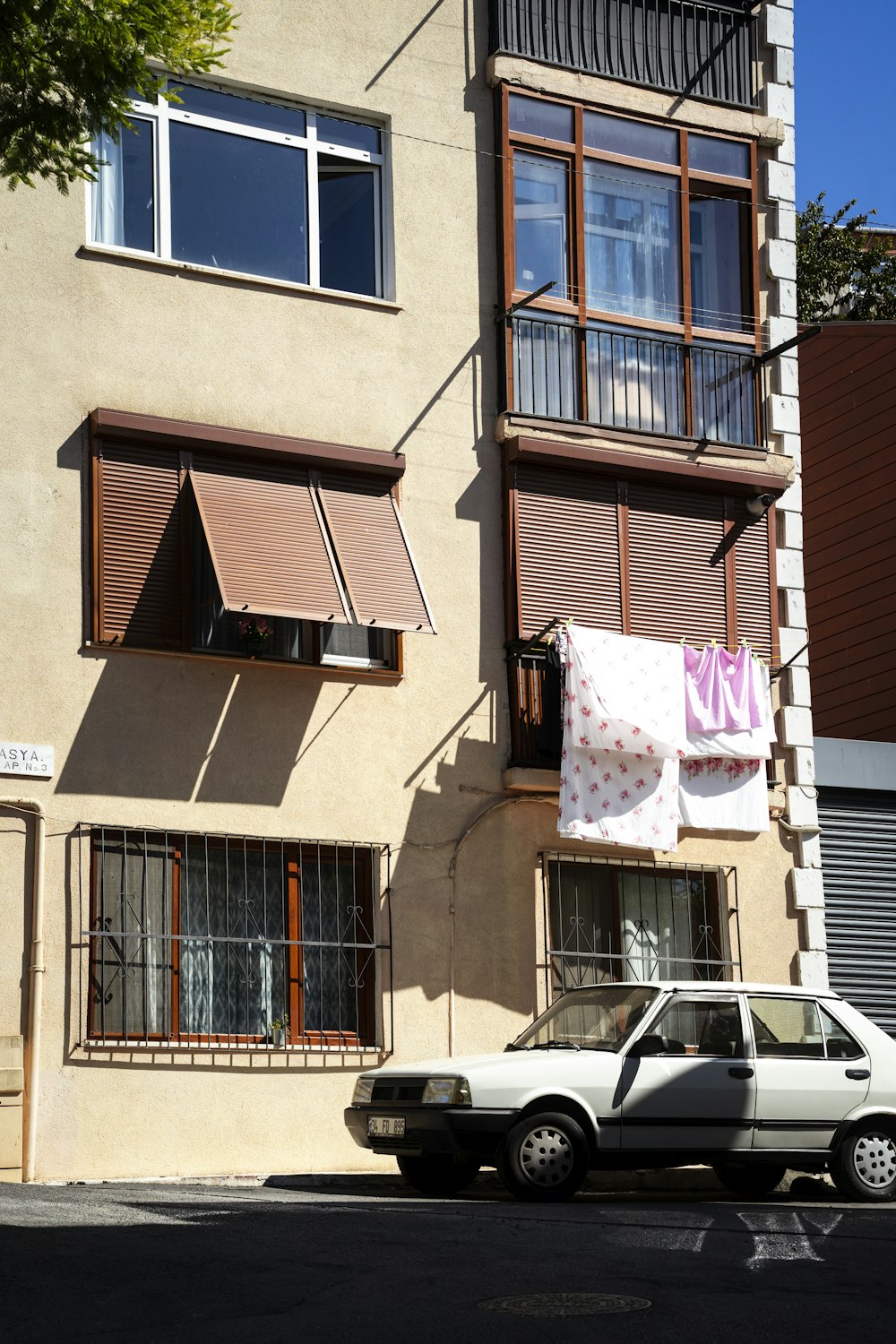 a car is parked in front of a building