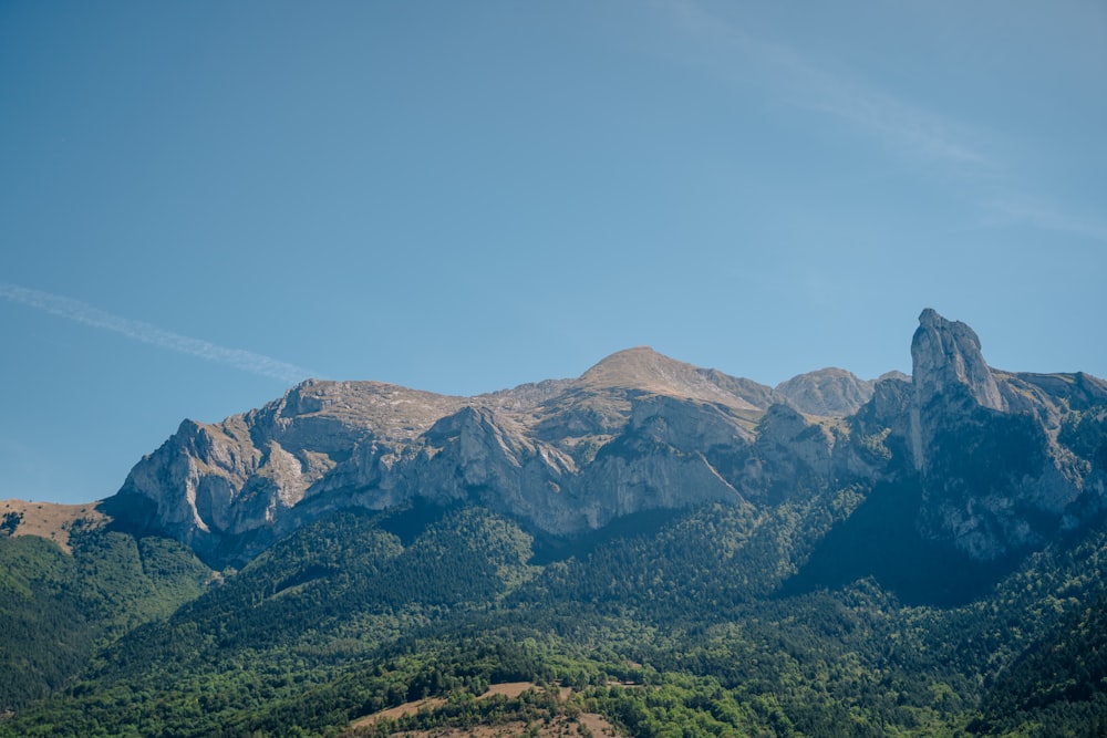 a view of a mountain range with a clear blue sky