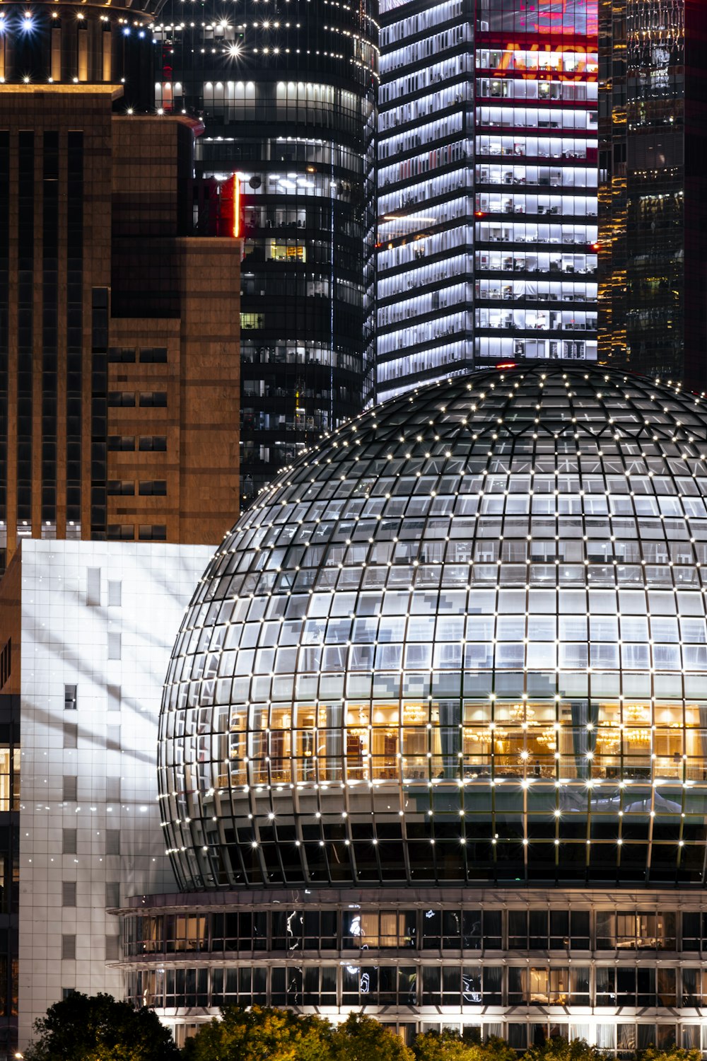 a large glass dome in the middle of a city