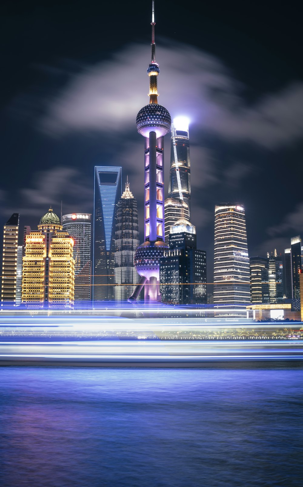 a long exposure photo of a city at night