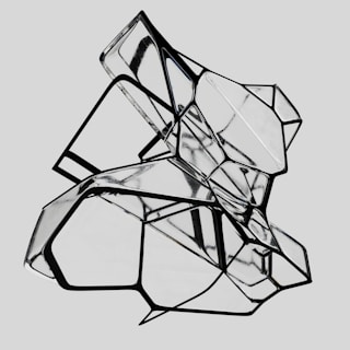 A complex geometric structure composed of interconnected transparent panels and black outlines. The structure is abstract, creating an intricate pattern of reflections and angles.