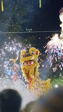 Animated Fire Horse coin spinning with glowing Chinese New Year decorations.