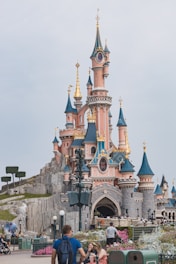 Children playing inside a whimsical castle with colorful turrets and magical decorations.