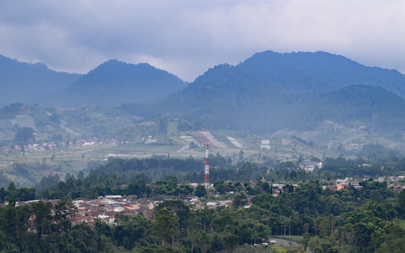 A panoramic view of Balkh province with wireless signal icons indicating coverage areas.