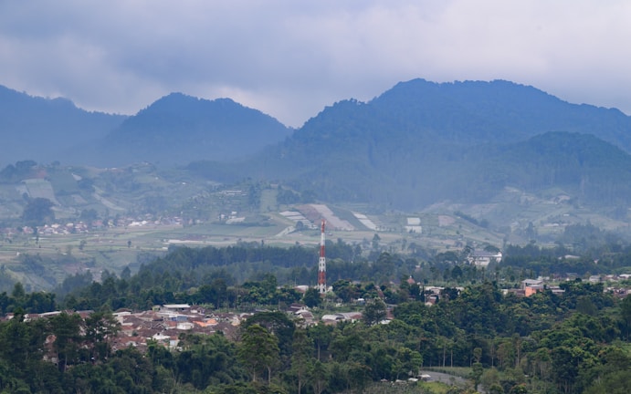 A panoramic view of Balkh province with wireless signal icons illustrating coverage.