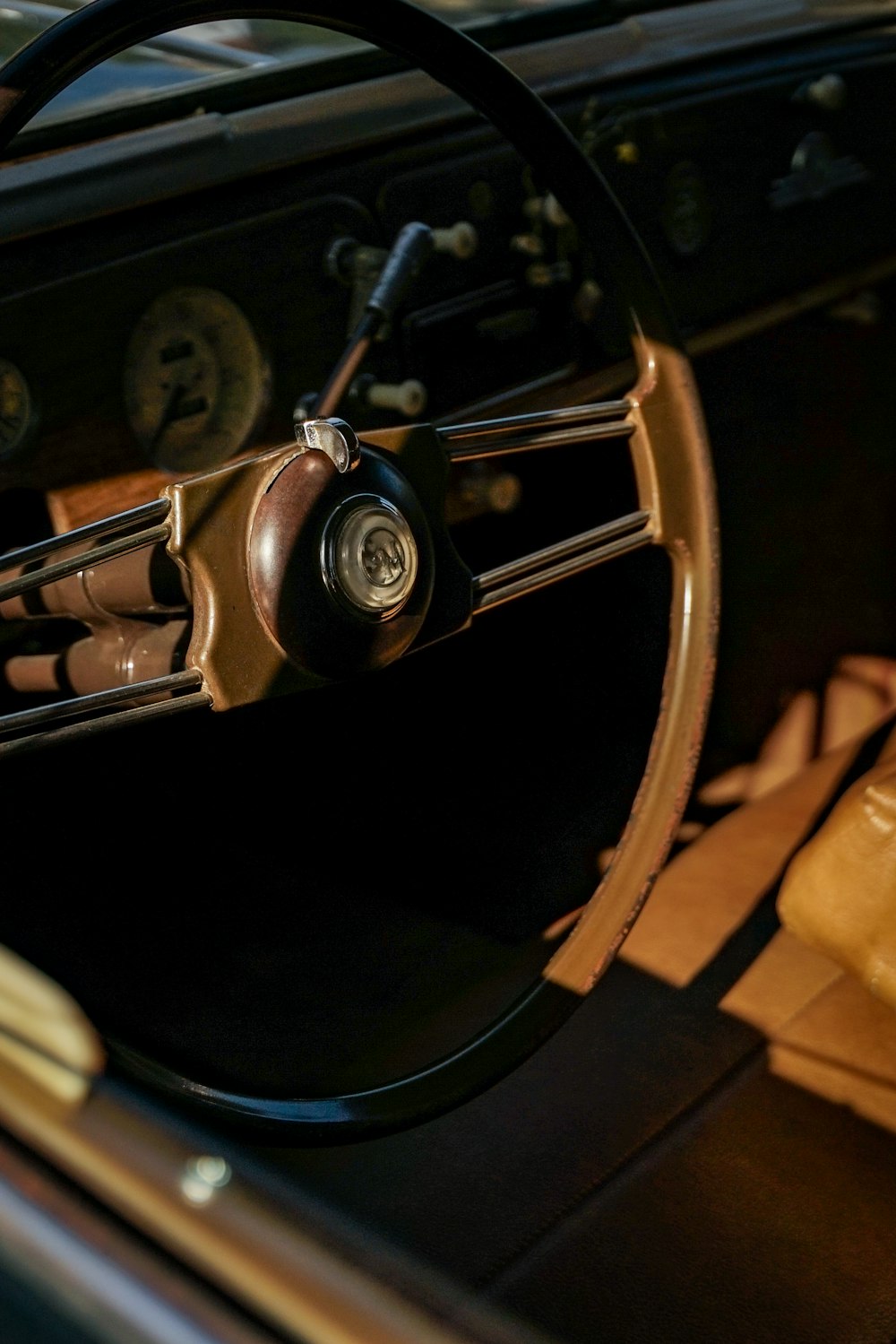 a steering wheel and dashboard of a car