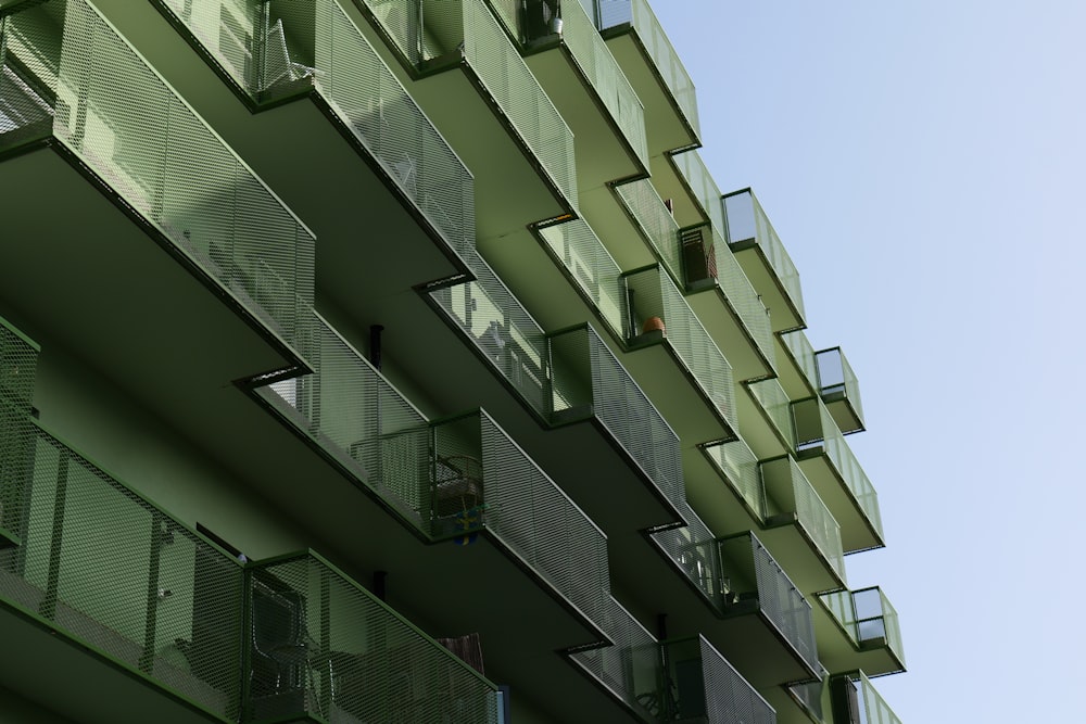 a tall building with balconies and balconies on the side