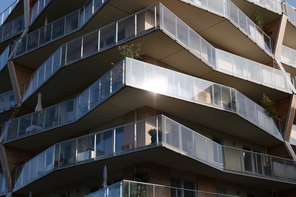 a tall building with balconies and balconies on the sides