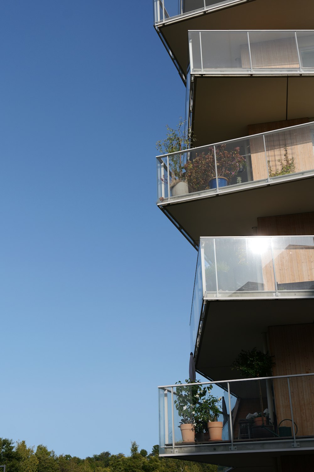 a tall building with balconies and balconies on the balconies