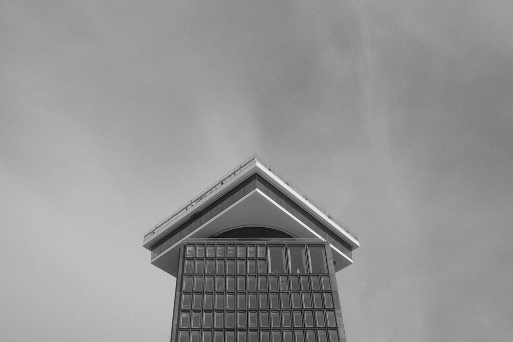 a black and white photo of a clock tower