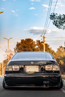 A car parked with a visible license plate for lookup.