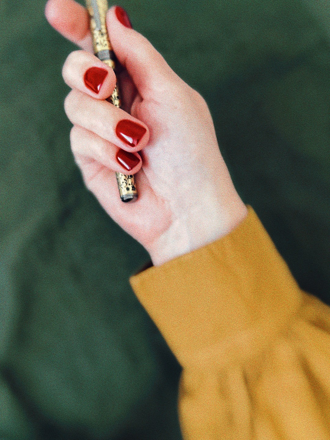 Elegant deep green Christmas manicure