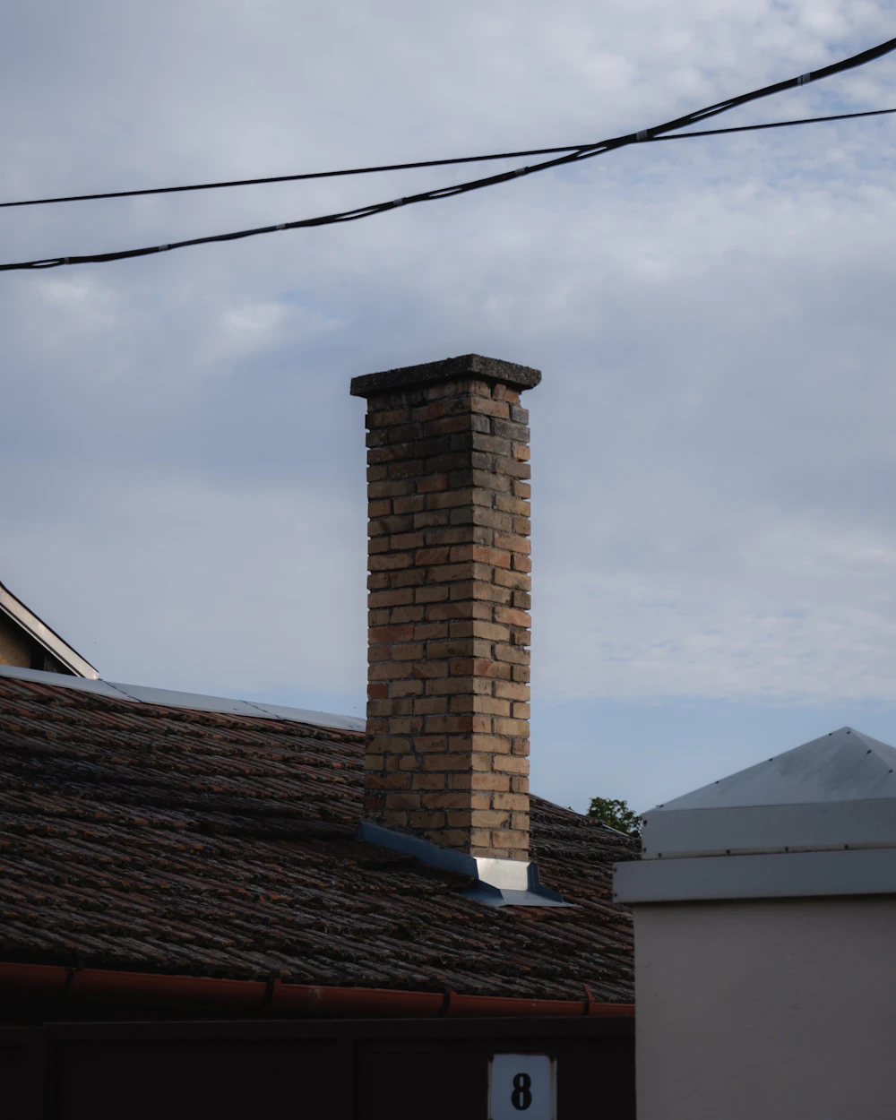 Real brick masonry chimney stack structure