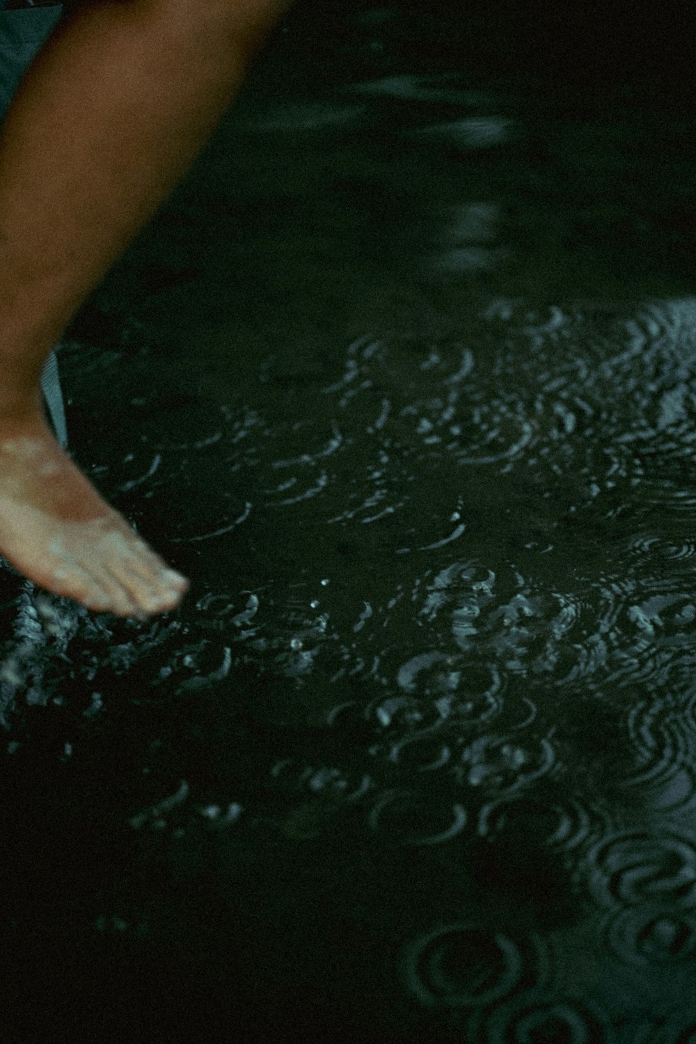 a person standing in a pool of water