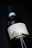 A bottle of wine is displayed against a dark background. The label on the bottle reads 'Synthesi Aglianico del Vulture' and it indicates the year 2018. There is an illustration of a mountain on the label and the word 'Paternoster' is written at the bottom.