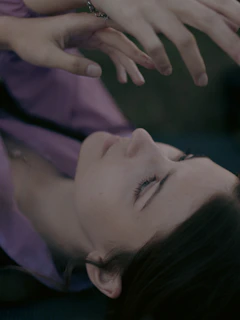 a close up of a person laying on the ground