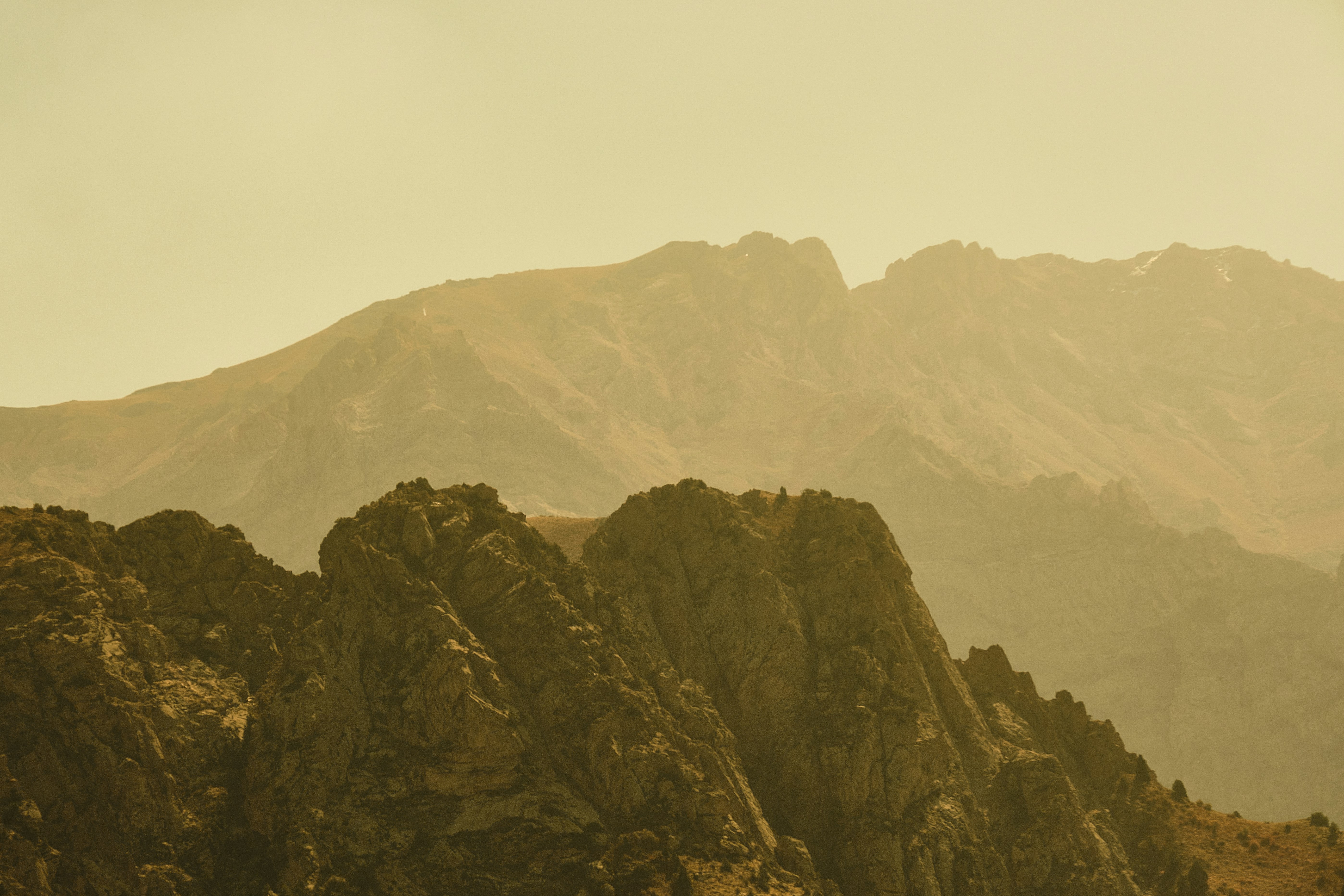 a view of a mountain range from a distance