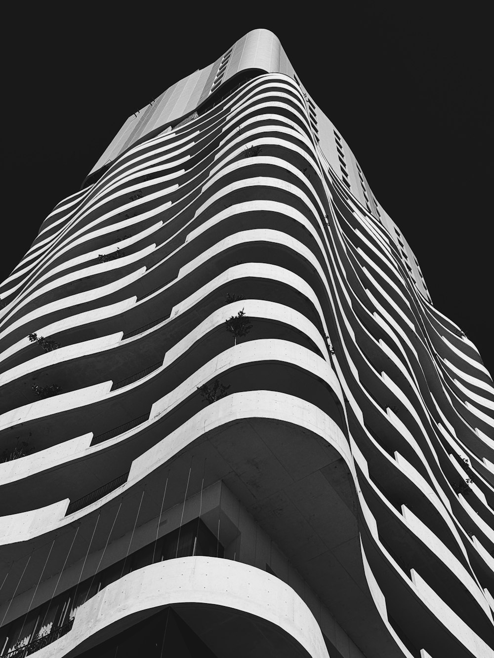 a black and white photo of a tall building